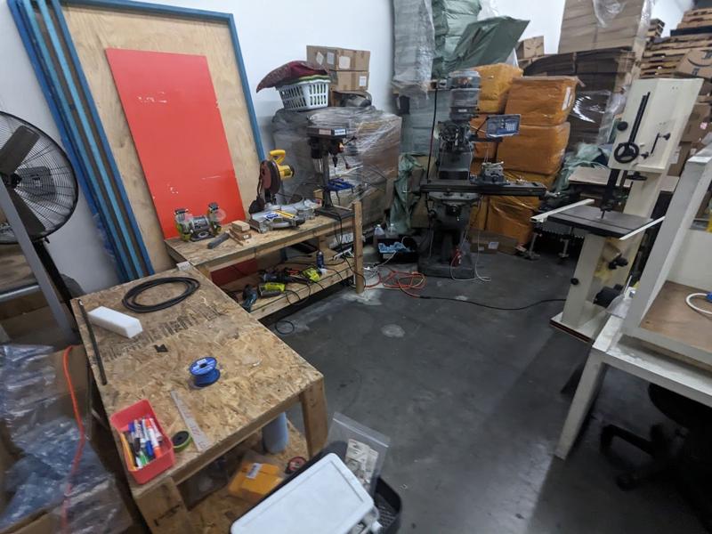 Our workshop, with the donated mill and bandsaw